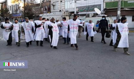جمعی از کفن پوشان کرمانی در مراسم تشییع پیکر سپهبد سلیمانی + عکس