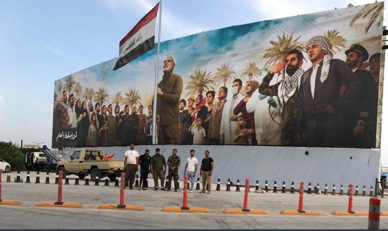 افراشتن پرچم مقاومت در فرودگاه بغداد + عکس