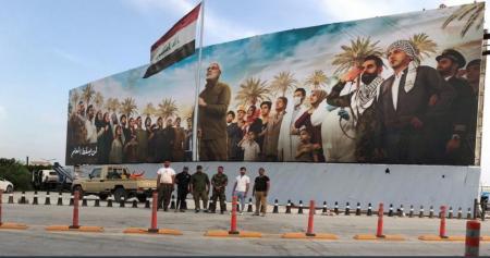 افراشتن پرچم مقاومت در فرودگاه بغداد + عکس
