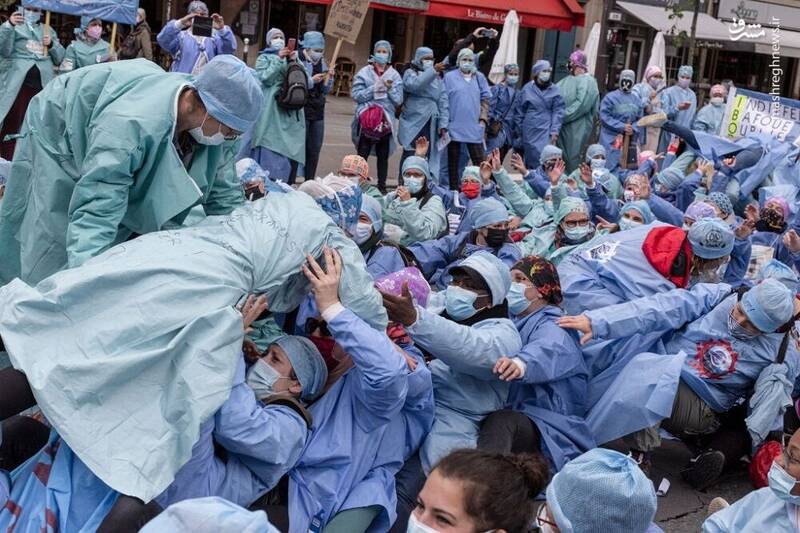 اعتراض پرستاران فرانسوی به شرایط بد کاری + عکس