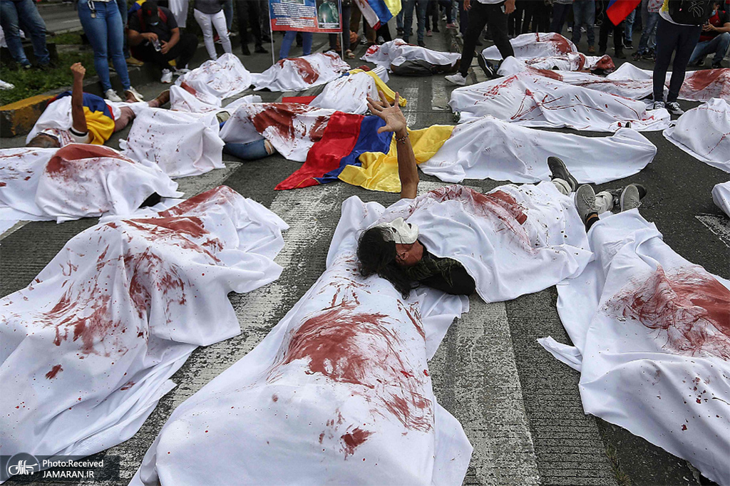 ادای احترام به قربانیان خشونت پلیس دولت کلمبیا + عکس