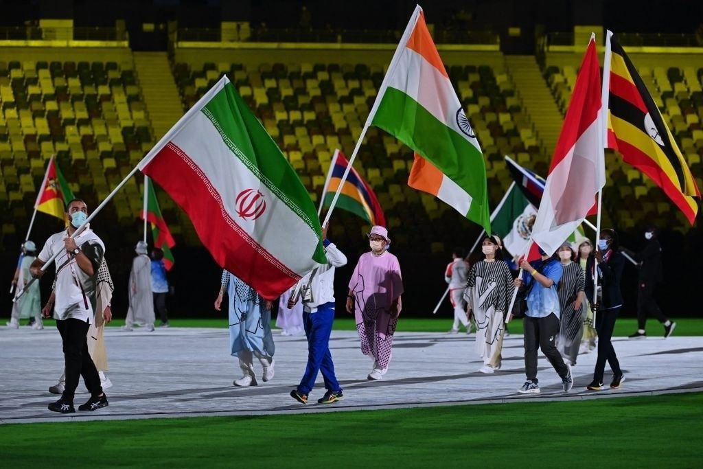 پرچمدار ایران در مراسم اختتامیه المپیک ٢٠٢٠ + عکس