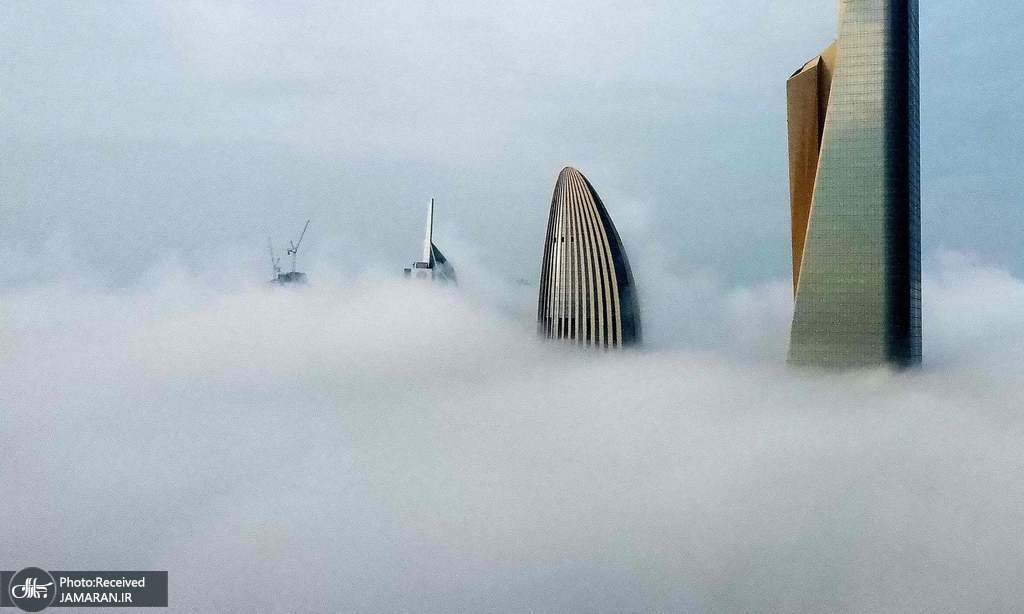 تصویری جالب و دیدنی از کویت زیر مه شدید + عکس