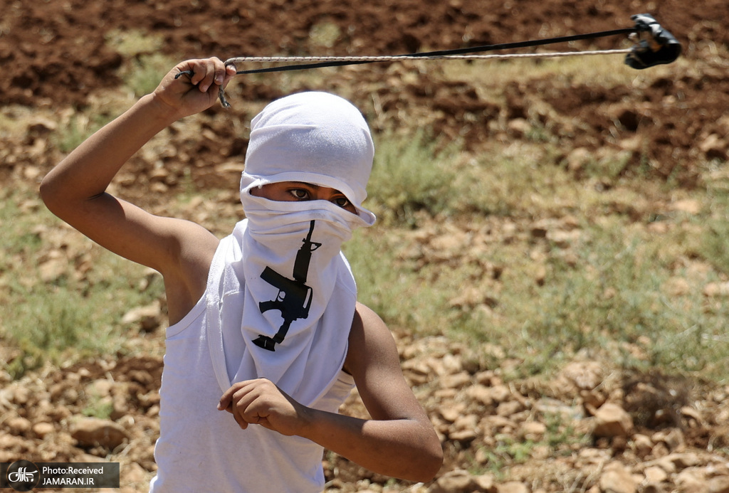 نوجوان فلسطینی در میانه جنگ + عکس