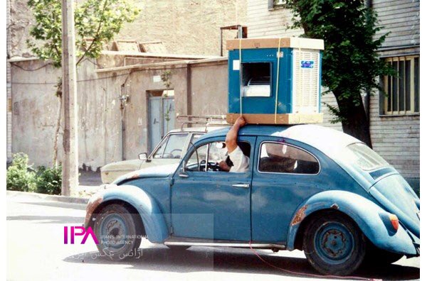 تصویر عجیب از یک فولکس در تابستان دهه هفتاد تهران