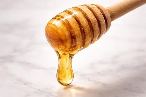 عسل چگونه می‌تواند به کاهش سرفه کمک کند؟