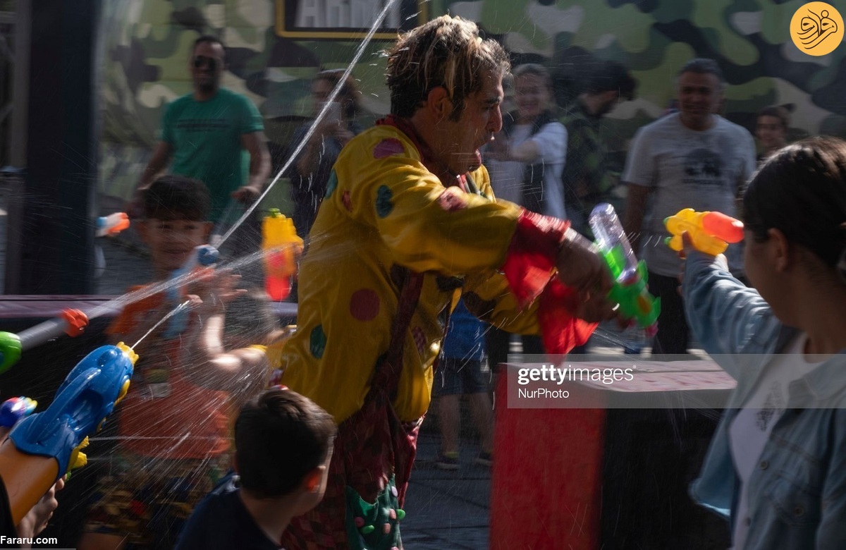 جشنواره آب بازی با تفنگ‌های آبی در تهران + عکس - تلگرام آپ